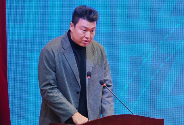 【人物】重返故乡扎根篮球城 属于李根的华丽转身